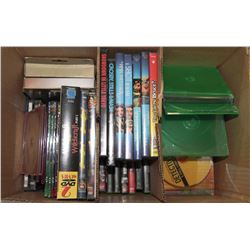 BOX OF DVDS & CDS. SOME CASES EMPTY