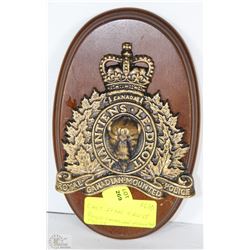 CAST IRON CREST ROYAL CANADIAN MOUNTED POLICE