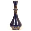 Image 1 : A Sevres Vase, decorated gilt arabesque scrolls on a blue ground, 23 cm  See illustration £30 - 4...