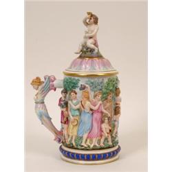 A Naples Mug and Cover, decorated dancing figures, satyrs and children, 34 cm  See illustration £...