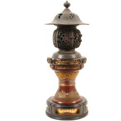 A Late 19th Century Japanese Bronze and Lacquer Incense Burner, with pierced cover, applied panel...