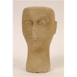 A Carved Marble Head, 20 cm  See illustration £100 - 150...
