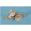 Image 1 : A Two Stone Diamond Crossover Ring  See illustration £280 - 320...