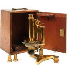A Victorian Brass Microscope, R & J Beck, in a mahogany case £140 - 180...