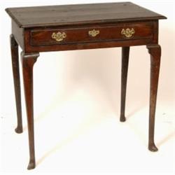 A Georgian Oak Side Table, with a single frieze drawer, on cabriole legs with pad feet, 83 cm  Se...