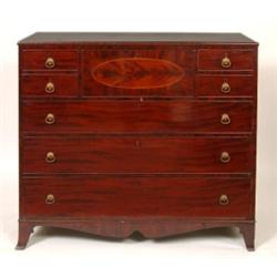 A Regency Mahogany Secretaire Chest, the secretaire drawer flanked by four short drawers above th...