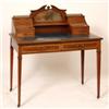 Image 1 : An Edwardian Inlaid Mahogany Writing Desk, the mirrored back with two concave stationery compartm...