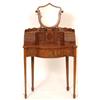 Image 1 : A Mahogany Dressing Table, the shield shaped mirror above a superstructure and three frieze drawe...