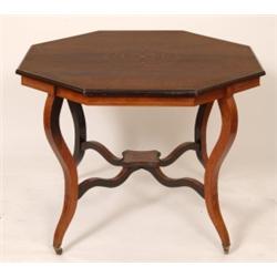 A Victorian Inlaid Rosewood Centre Table, the octagonal top, on four cabriole legs, 90 cm  See il...