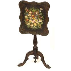 A Victorian Occasional Table, the slate top painted flowers within a gilt border, on an ebonised...