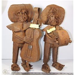PAIR OF METAL MEN PLAYING INSTRUMENTS