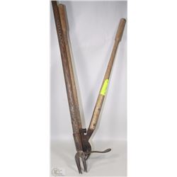 TWO VINTAGE YARD TOOLS