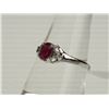 Image 2 : #34-10K WHITE GOLD RUBY (0.60CT) AND DIAMOND RING