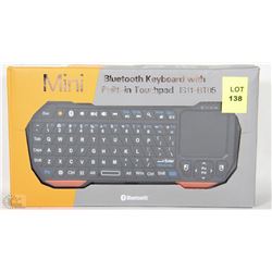 NEW MINI BLUETOOTH KEYBOARD WITH BUILT IN