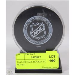 TAYLOR HALL HOCKEY PUCK SIGNED