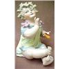 Bisque piano baby, seated child in dress hold