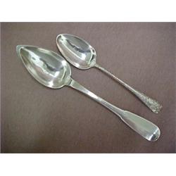 Two silver serving spoons including a French