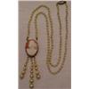 Image 1 : Cameo and faux pearl flapper necklace has car