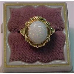 10K yellow gold and opal ring 3/4" long with