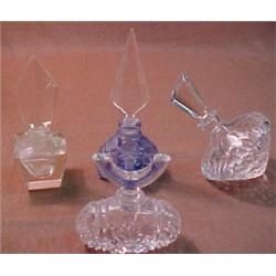 One lot of four crystal perfume bottles inclu