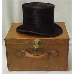 Man's top hat in leather case, sheared beaver