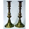 Image 1 : A pair of cast brass push-up candlesticks, ro
