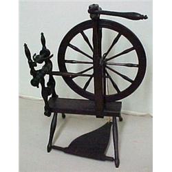 Mixed woods 19th C. spinning wheel, signed on