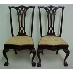 A pair of walnut Chippendale style side chair