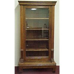 Oak glass door bookcase, molded cornice over