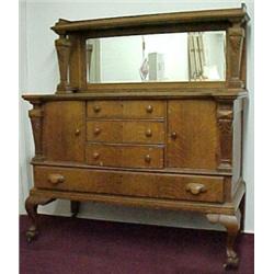 Oak sideboard, rectangular top over beveled m