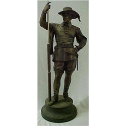 Spelter figural lamp, standing musketeer on r