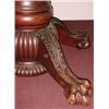 Image 2 : Round mahogany dining table with six leaves,