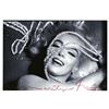 Image 1 : BERT STERN: MARILYN MONROE STRETCHING THE BEADS.