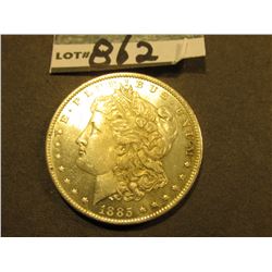 1885 O Morgan Silver Dollar. Lightly toned Uncirculated.