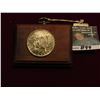 Image 1 : Walnut Plaque with 1922 U.S. Peace Silver Dollar attached. Toned Uncirculated.