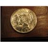Image 2 : Walnut Plaque with 1922 U.S. Peace Silver Dollar attached. Toned Uncirculated.