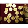 Image 2 : (18) GEM BU 1945 P Mercury Dimes from an original roll. Stored in a plastic tube.