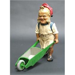 Late 19th century Austrian painted terracotta figure of a garden gnome with his wooden wheelbarro...