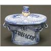 Image 1 : An unusual continental porcelain tobacco box and cover in the form of a hat box, moulded with rib...