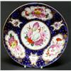 Image 1 : Early 19th century Coalport plate painted in gilt scroll reserves with bouquets of English summer...