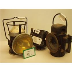 Three old railway lamps…