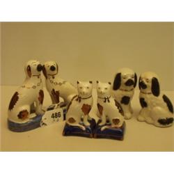 Three pairs of Staffordshire animals, dogs an…