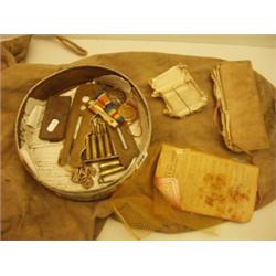 Tin containing military ephemera, medals and…