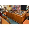 Image 1 : Mid century modern teak sideboard with two sliding doors, one of which exposes two flatware drawers,