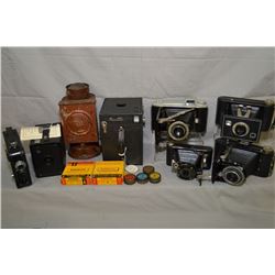 Selection of Kodak cameras and accessories including Junior Six Hawkeye box camera, Model # 20 movie