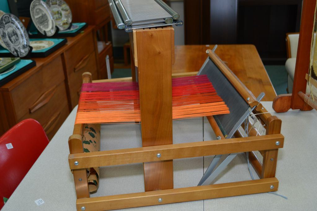 Small Nilus Leclerc weaving loom with 16" weave base and an upright