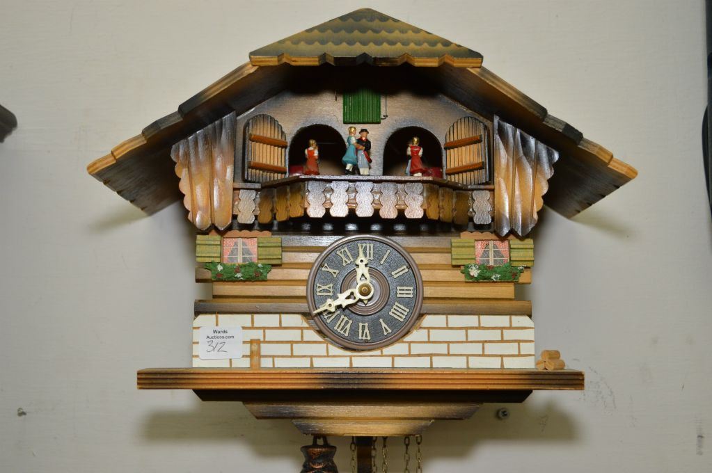 Musical wall mount cuckoo clock with dancing figures