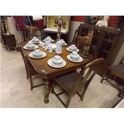 TABLE WITH 2 LEAFS AND 6 CHAIRS