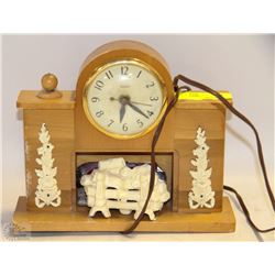 AS IS UNITED MANTLE CLOCK WITH FIREPLACE
