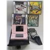 Image 1 : NINTENDO DS WITH 4 GAMES GUITAR HERO,UNSOLVED